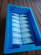 Load image into Gallery viewer, The SWABBO Footwasher is the perfect solution to reducing cleaning time and minimising the discomfort of having sand all through the house.